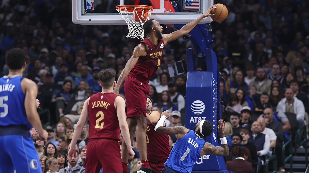 Cleveland Cavaliers forward Evan Mobley (4) blocks the shoty of Dallas Mavericks guard Jaden Hardy (1) during the first half at American Airlines Center.