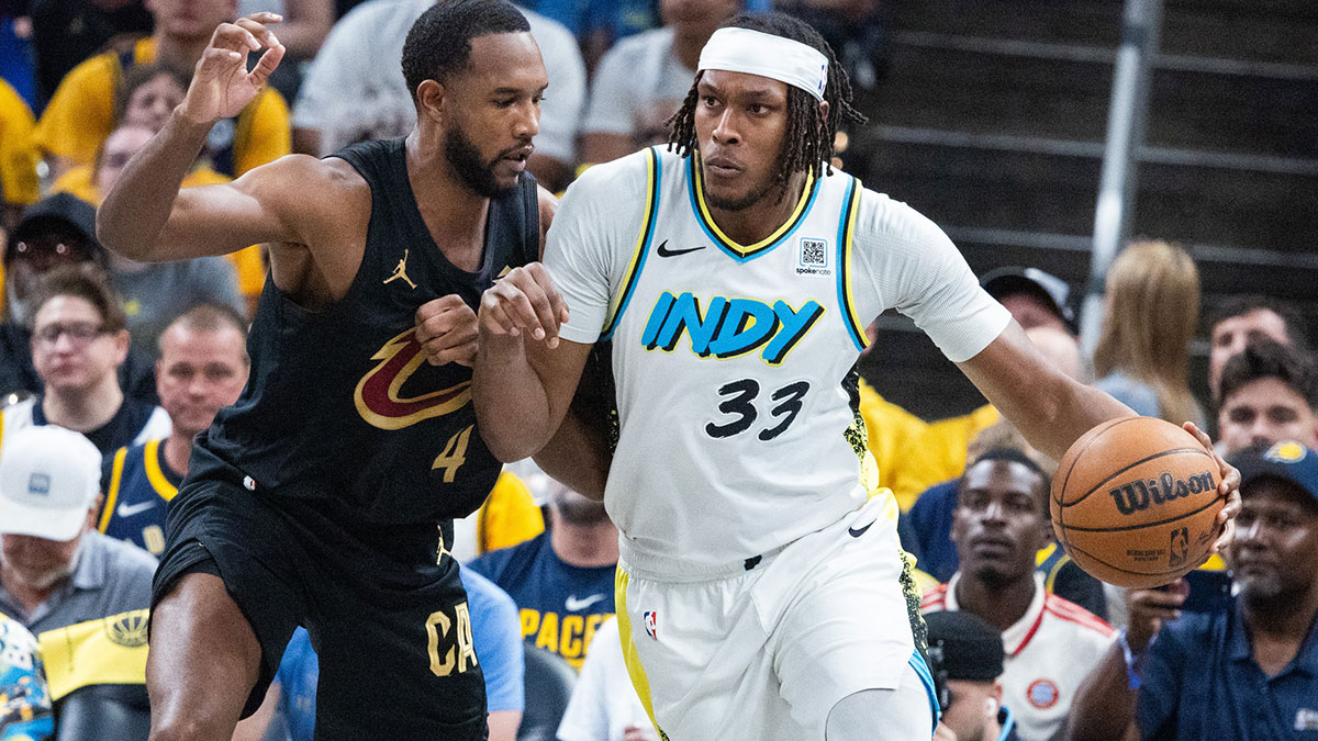 Indiana Pacers center Myles Turner (33) dribbles the ball while Cleveland Cavaliers forward Evan Mobley (4) defends during game four of the second round for the 2025 NBA Playoffs at Gainbridge Fieldhouse.