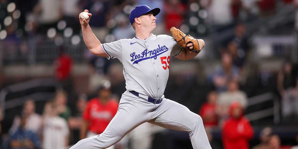 May 2, 2025; Atlanta, Georgia, USA; Los Angeles Dodgers relief pitcher Evan Phillips (59) throws a pitch against the Atlanta Braves in the ninth inning at Truist Park. 