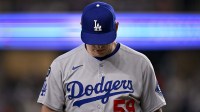 Los Angeles Dodgers relief pitcher Evan Phillips (59) comes off the field during the game between the Texas Rangers and the Los Angeles Dodgers at Globe Life Field.