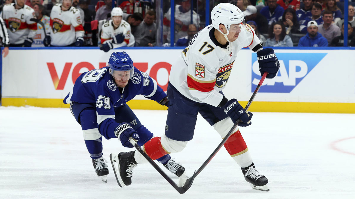 Tampa Bay Lightning center Jake Guentzel (59) defends Florida Panthers center Evan Rodrigues (17) during the second period of game five of the first round of the 2025 Stanley Cup Playoffs at Amalie Arena.