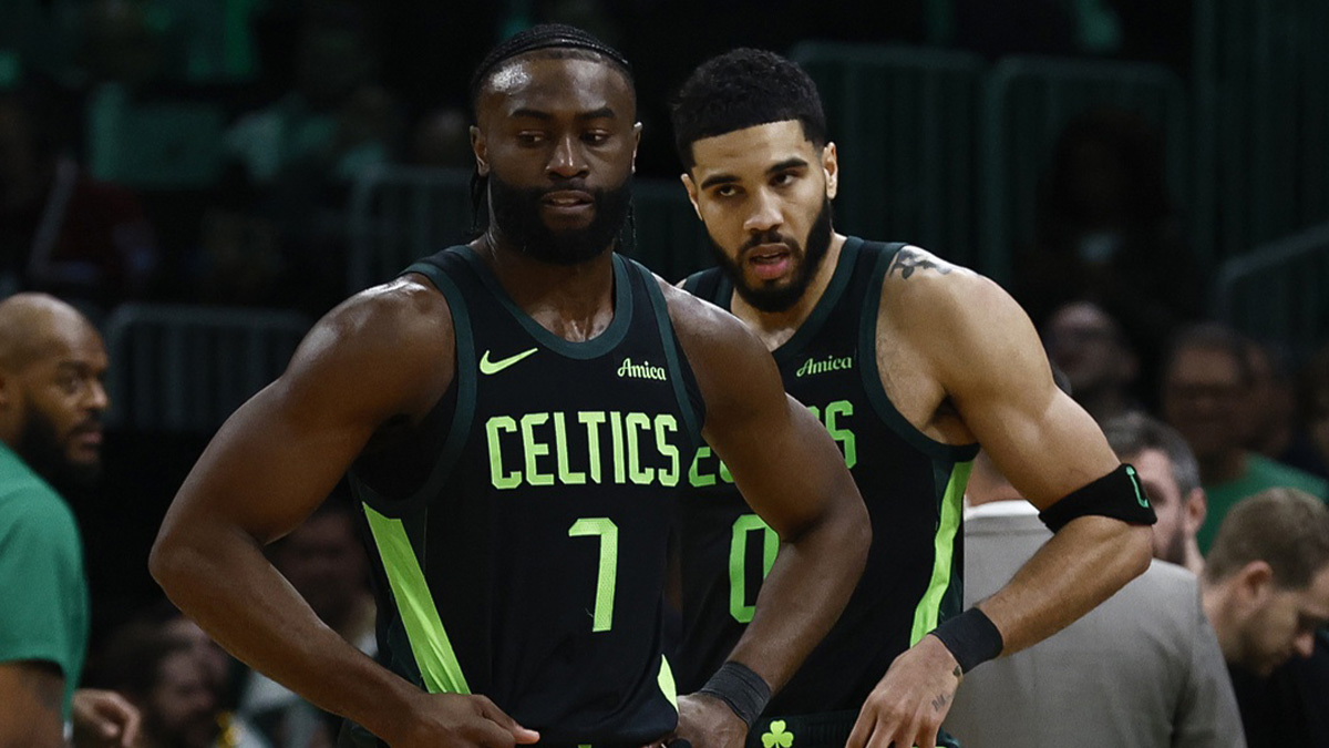 Boston Celtics guard Jaylen Brown (7) and forward Jayson Tatum (0) stand on the court during a timeout during the second half of their loss to the Cleveland Cavaliers at TD Garden.