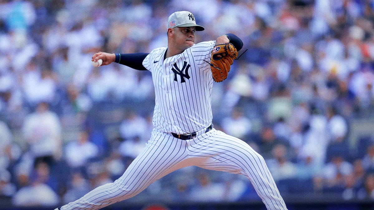New York Yankees relief pitcher Fernando Cruz (63) pitches against the New York Mets during the ninth inning at Yankee Stadium.