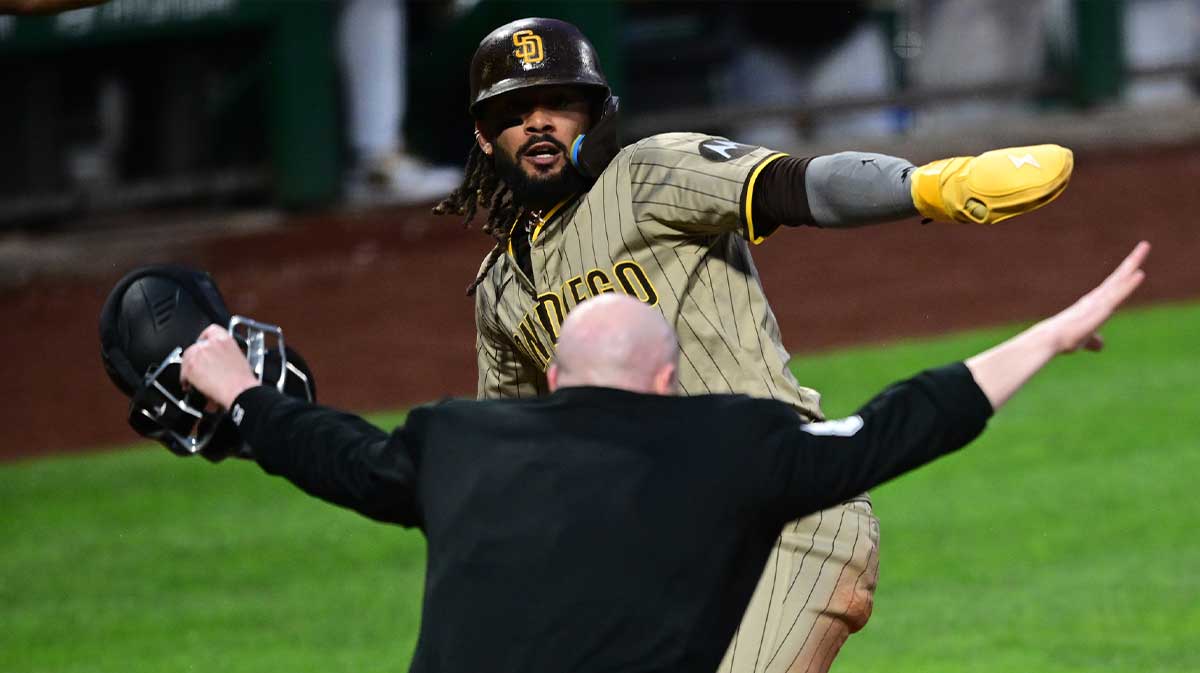 San Diego Padres right fielder Fernando Tatis Jr. (23) celebrates after scoring a run after a wild pitch by Pittsburgh Pirates relief pitcher David Bednar (51) during the ninth inning at PNC Park.