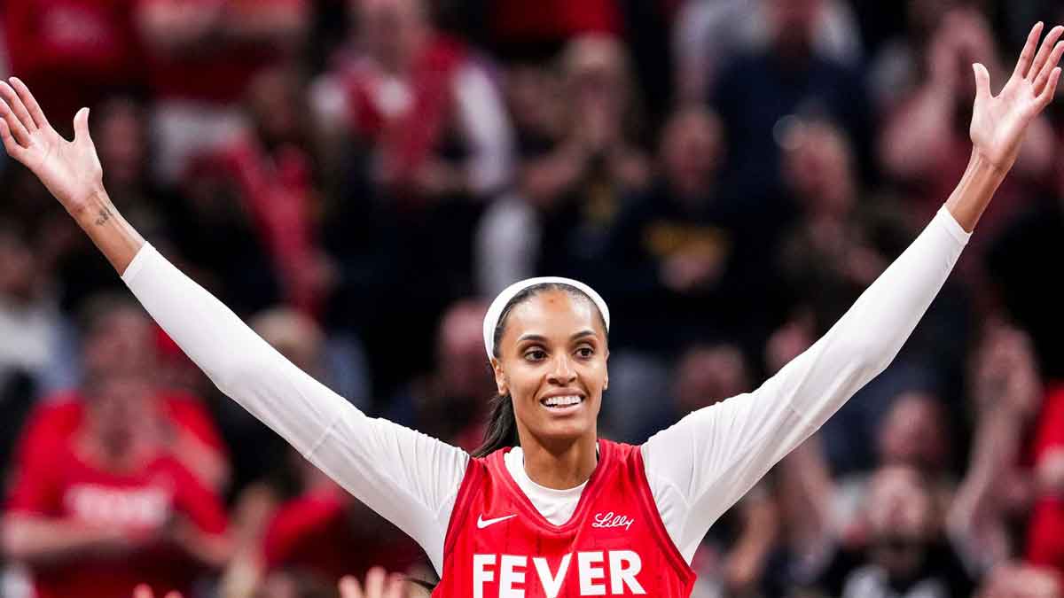 Indiana Fever forward DeWanna Bonner (25) celebrates after becoming the third all-time leading scorer in WNBA history Saturday, May 17, 2025, during a game between the Indiana Fever and the Chicago Sky at Gainbridge Fieldhouse in Indianapolis. The Indiana Fever defeated the Chicago Sky, 93-58.