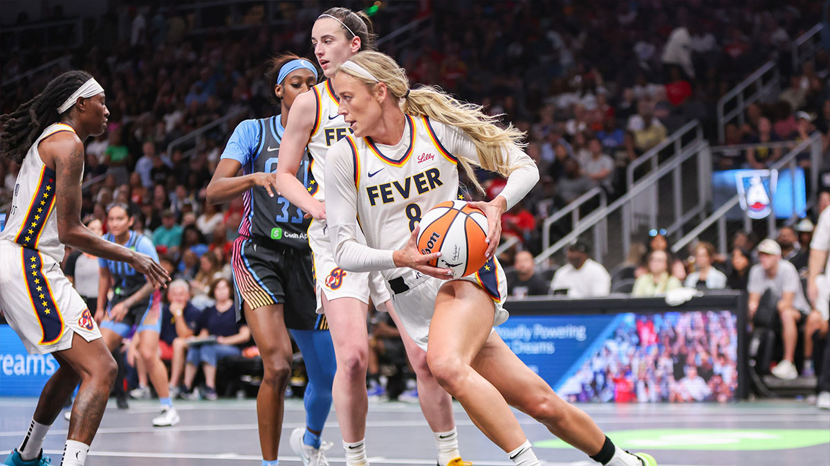 Indiana Fever guard Sophie Cunningham (8) dribbles against the Atlanta Dream in the first half at State Farm Arena.