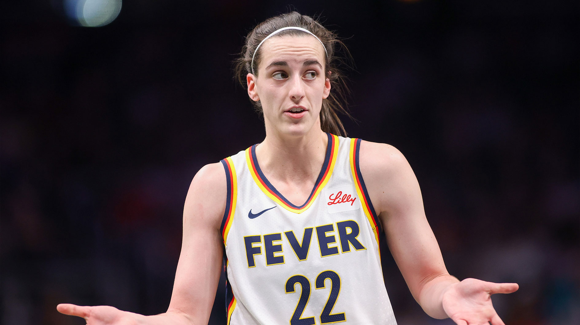 Indiana Fever guard Caitlin Clark (22) talks to a referee against the Atlanta Dream in the first half at State Farm Arena.