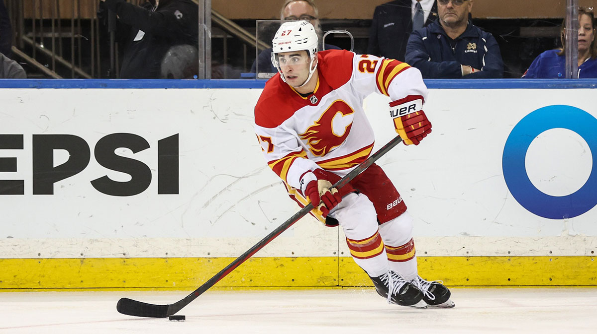 Calgary Flames right wing Matt Coronato (27) controls the puck in the third period against the New York Rangers at Madison Square Garden.