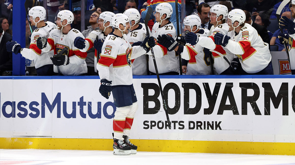 Florida Panthers center Sam Reinhart (13) is congratulated after he scored a goal against the Tampa Bay Lightning during the third period of game five of the first round of the 2025 Stanley Cup Playoffs at Amalie Arena.