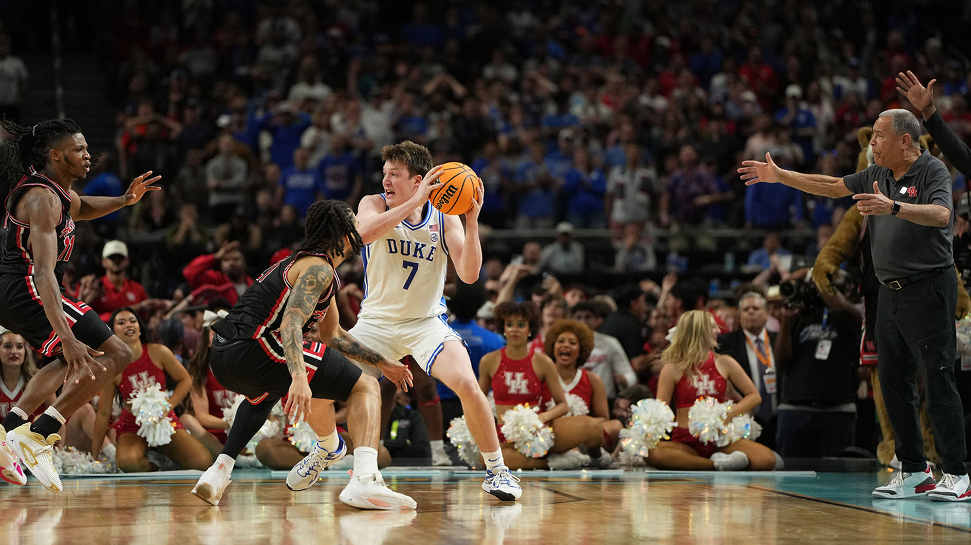 Duke Blue Devils guard Kon Knueppel (7) controls the ball against the Houston Cougars during the second half in the semifinals of the men's Final Four of the 2025 NCAA Tournament at the Alamodome.
