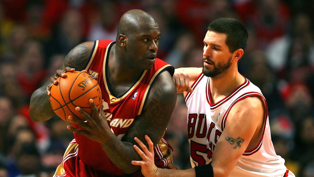 Cleveland Cavaliers center Shaquille O'Neal (33) being defended by Chicago Bulls center Brad Miller (52) during the second quarter in game four of the first round of the 2010 NBA playoffs at the United Center.