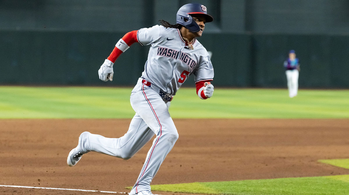 Washington Nationals base runner CJ Abrams scores in the sixth inning against the Arizona Diamondbacks at Chase Field.