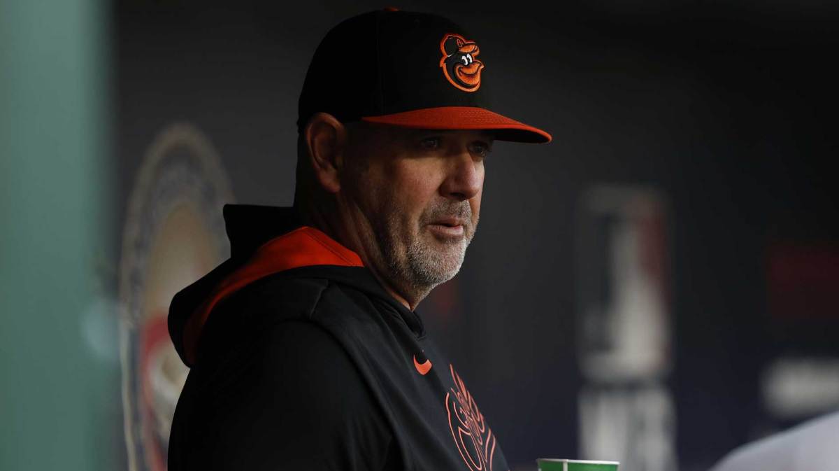 Baltimore Orioles manager Brandon Hyde stands in the dugout prior to the start of the game against the Washington Nationals at Nationals Park.