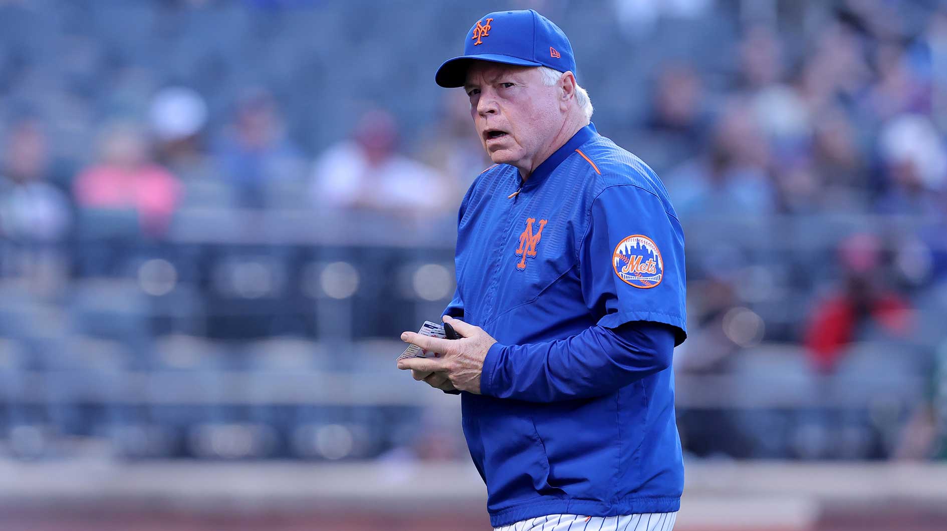 New York Mets manager Buck Showalter (11) walks off the field after a pitching change during the ninth inning against the Philadelphia Phillies at Citi Field.
