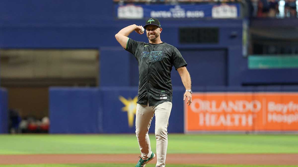 former Tampa Bay Rays third baseman Evan Longoria throws out the first pitch before a game against the Cleveland Guardians at Tropicana Field.