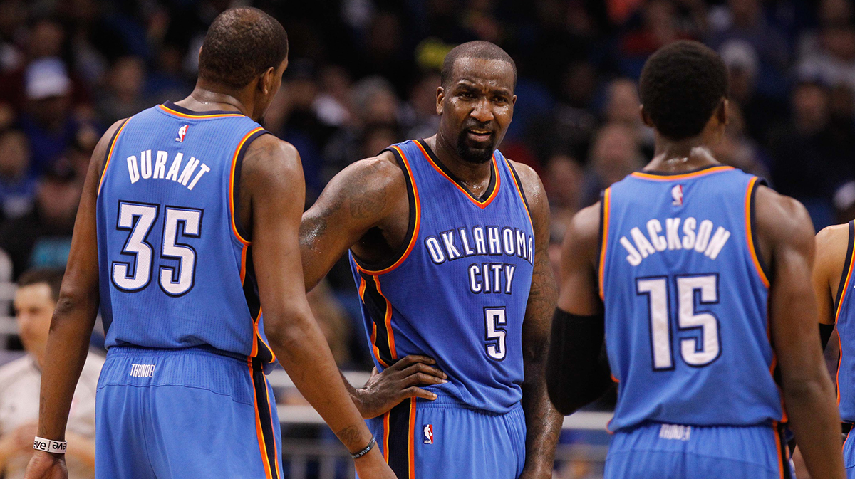 Thunder forward Kevin Durant (35), center Kendrick Perkins (5) and guard Reggie Jackson (15) talk against the Orlando Magic during the second quarter at Amway Center