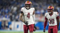 Washington Commanders linebacker Frankie Luvu (4) smiles after a play in the first half against the Detroit Lions in the NFC divisional round at Ford Field in Detroit on Saturday, Jan. 18, 2025.