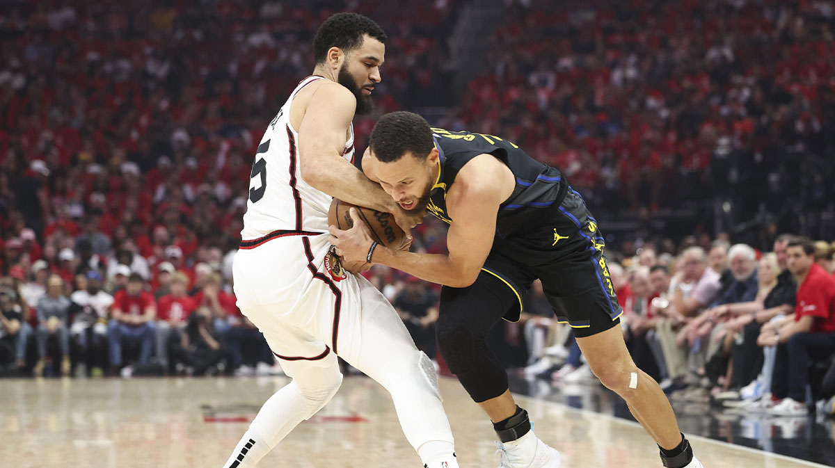 Houston Rockets guard Fred VanVleet (5) and Golden State Warriors guard Stephen Curry (30) battle for the ball during the first half of game seven of the first round for the 2025 NBA Playoffs at Toyota Center.