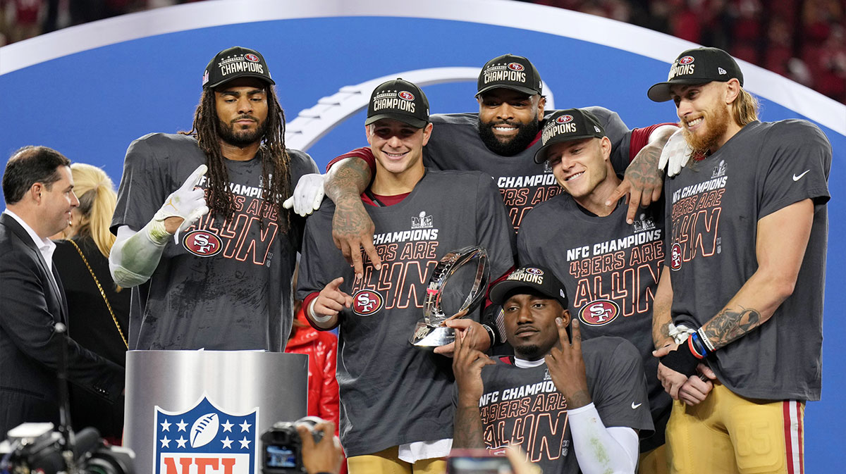 (Left to right) San Francisco 49ers linebacker Fred Warner (54), quarterback Brock Purdy (13), offensive tackle Trent Williams (71), wide receiver Deebo Samuel (19), running back Christian McCaffrey (23), tight end George Kittle (85) celebrate after winning the NFC Championship football game against the Detroit Lions at Levi's Stadium.