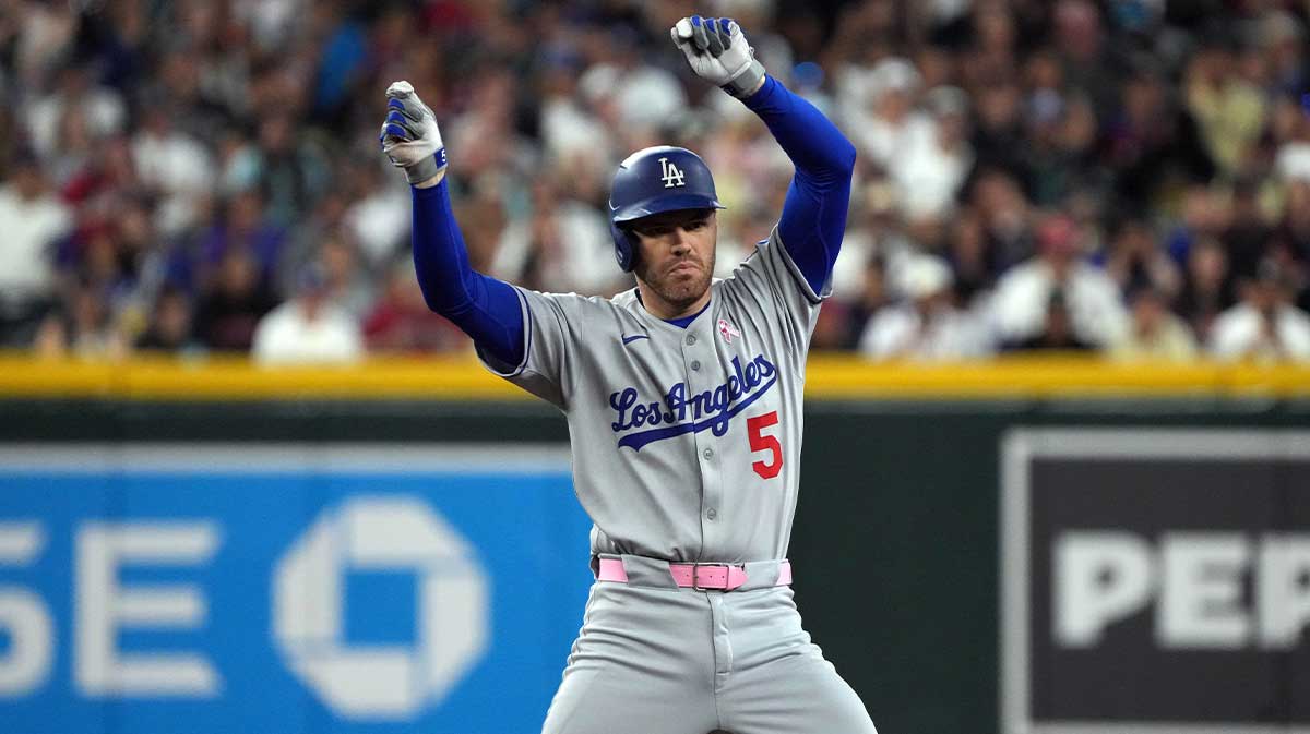Los Angeles Dodgers first base Freddie Freeman (5) reacts after hitting a double against the Arizona Diamondbacks in the third inning at Chase Field.