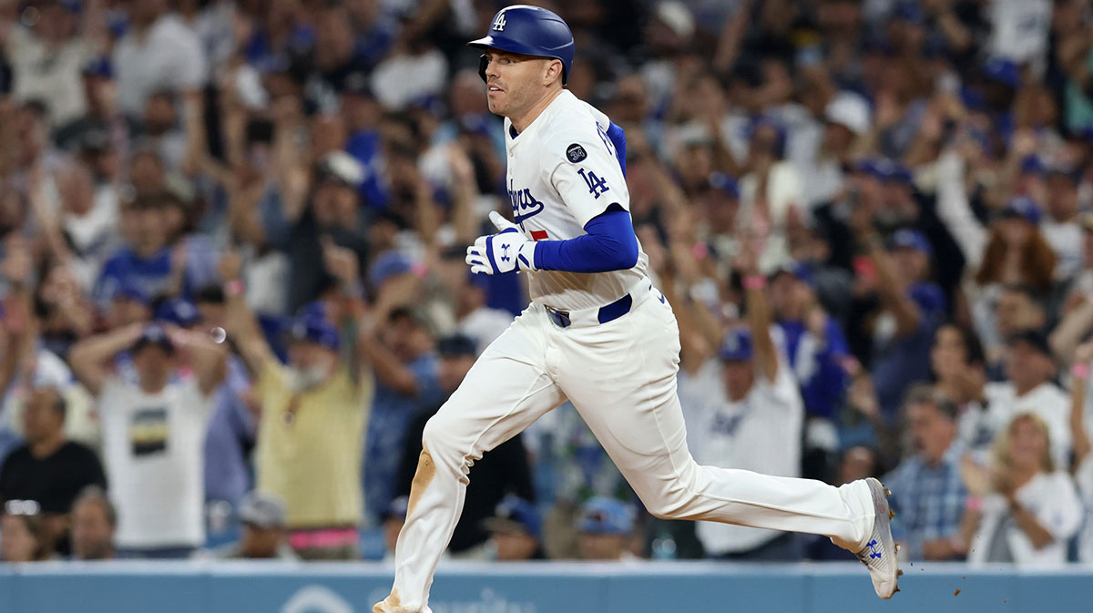 May 30, 2025; Los Angeles, California, USA; Los Angeles Dodgers first baseman Freddie Freeman (5) runs to second on a RBI double during the sixth inning against the New York Yankees at Dodger Stadium. Mandatory Credit: Jason Parkhurst-Imagn Images