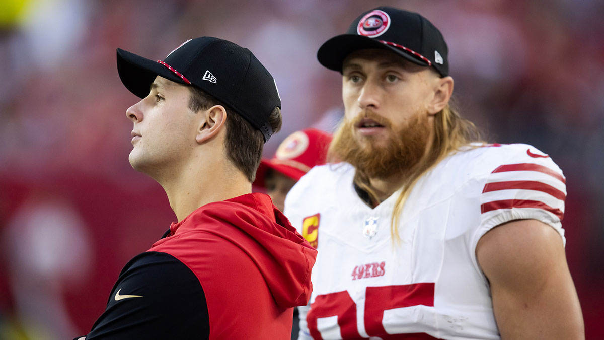 San Francisco 49ers quarterback Brock Purdy (left) with tight end George Kittle (85) against the Arizona Cardinals at State Farm Stadium.