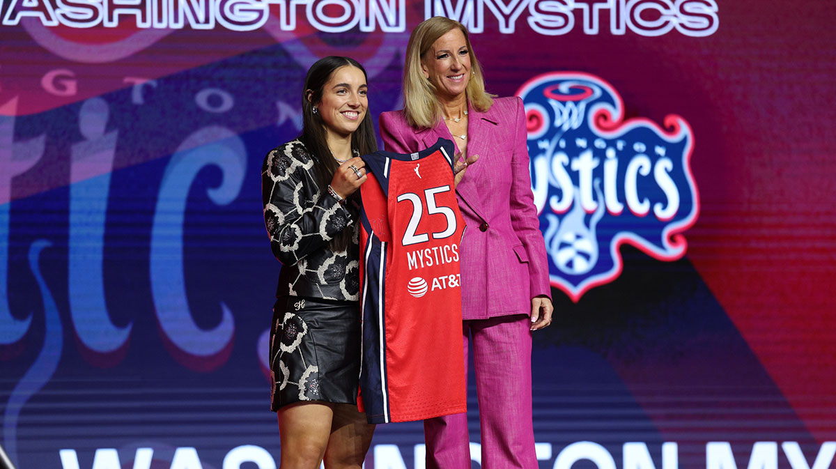 Georgia Amoore poses with WNBA commissioner Cathy Engelbert after being selected with the number six overall pick to the Washington Mystics in the 2025 WNBA Draft at The Shed at Hudson Yards.