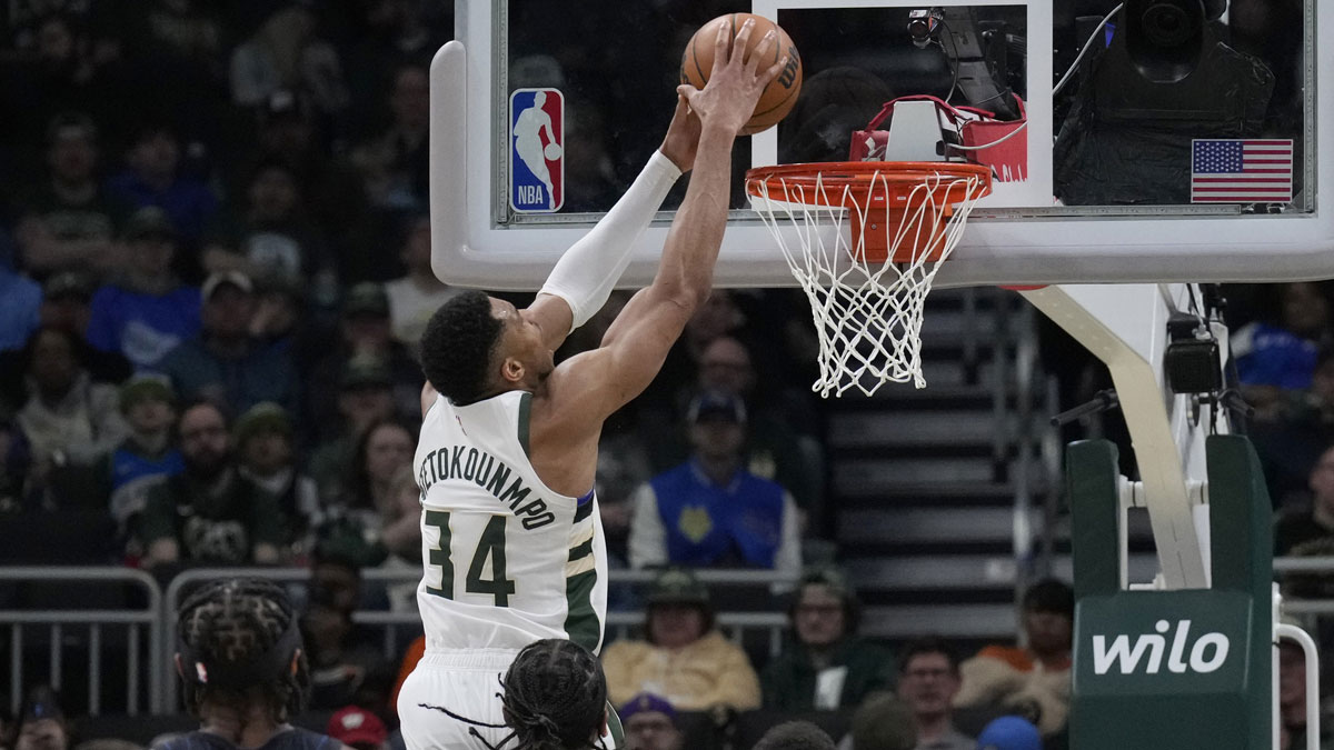 Milwaukee Bucks forward Giannis Antetokounmpo (34) dunks the ball against the Orlando Magic in the second half at Fiserv Forum.