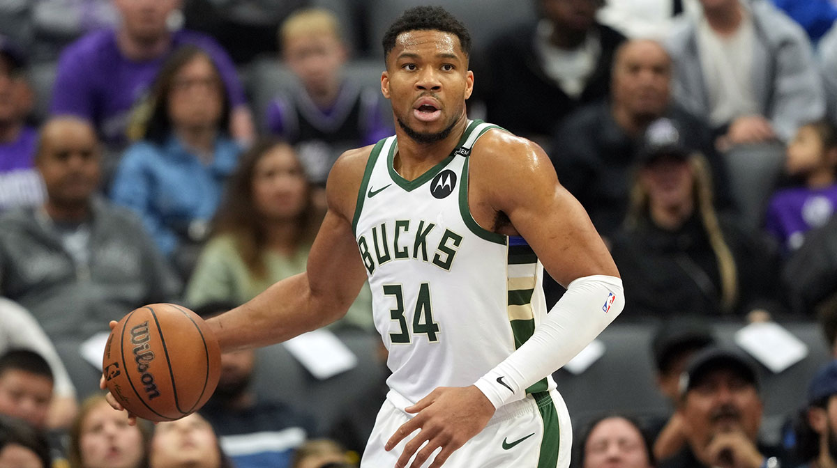 Milwaukee Bucks forward Giannis Antetokounmpo (34) handles the ball against the Sacramento Kings during the first quarter at Golden 1 Center.
