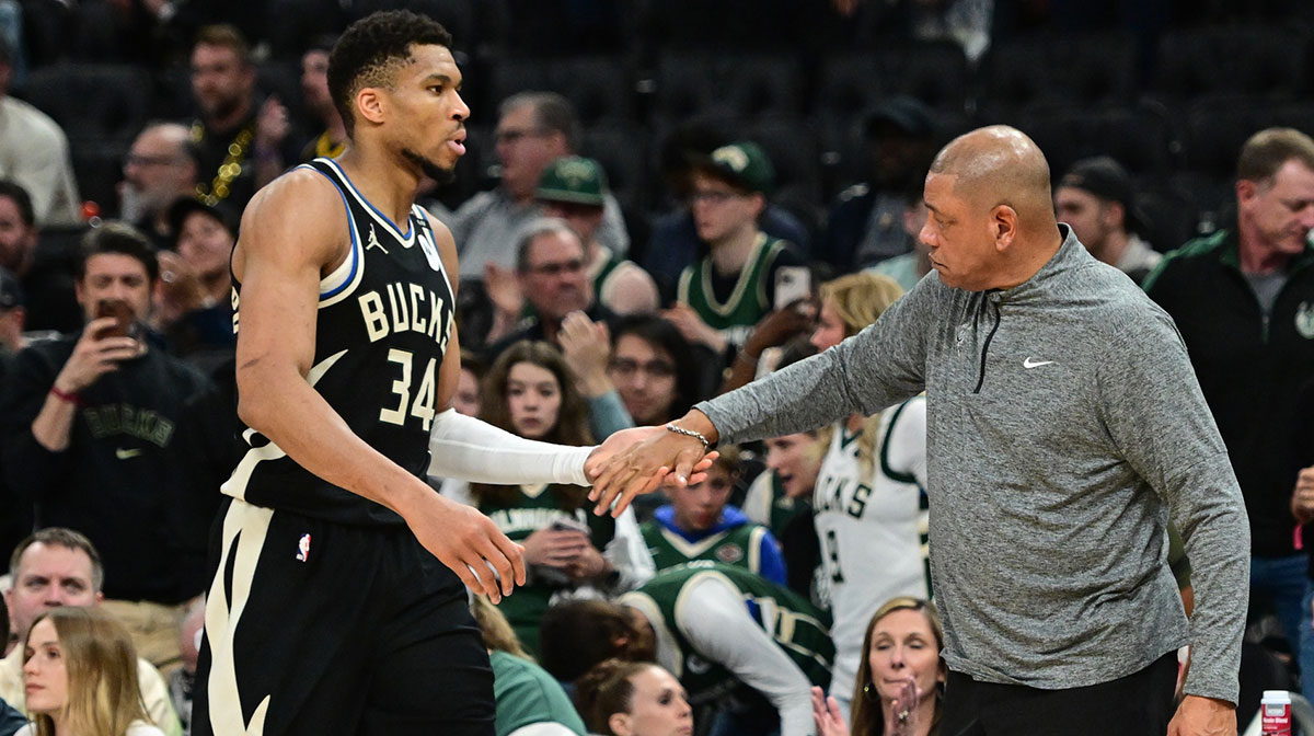 Milwaukee Bucks forward Giannis Antetokounmpo (34) exits the game in the fourth quarter as head coach Doc Rivers shakes his hand during game four against the Indiana Pacers of first round for the 2024 NBA Playoffs at Fiserv Forum.