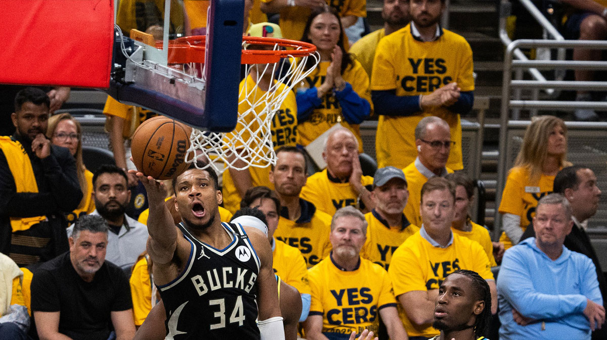 Milwaukee Bucks forward Giannis Antetokounmpo (34) shoots the ball while Indiana Pacers guard Andrew Nembhard (2) defends during game five of the first round for the 2024 NBA Playoffs at Gainbridge Fieldhouse.