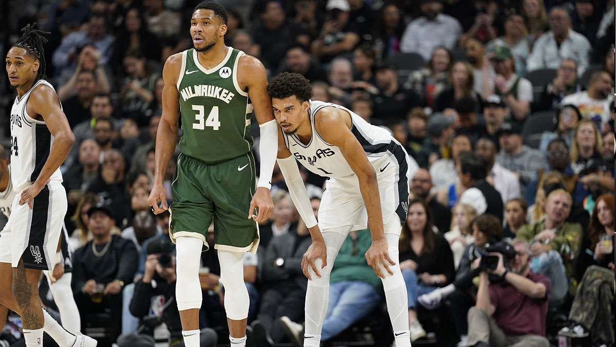Milwaukee Bucks forward Giannis Antetokounmpo (34) and San Antonio Spurs center Victor Wembanyama (1) during the first half at Frost Bank Center.
