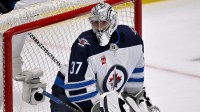 Winnipeg Jets goaltender Connor Hellebuyck (37) faces the Dallas Stars attack during the first period in game six of the second round of the 2025 Stanley Cup Playoffs at American Airlines Center.