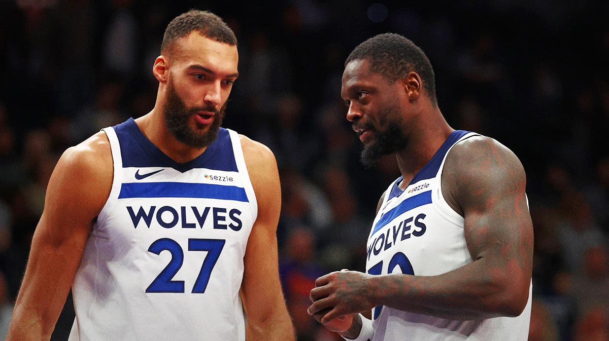 Minnesota Timberwolves center Rudy Gobert (27) and forward Julius Randle (30) against the Phoenix Suns at Footprint Center.