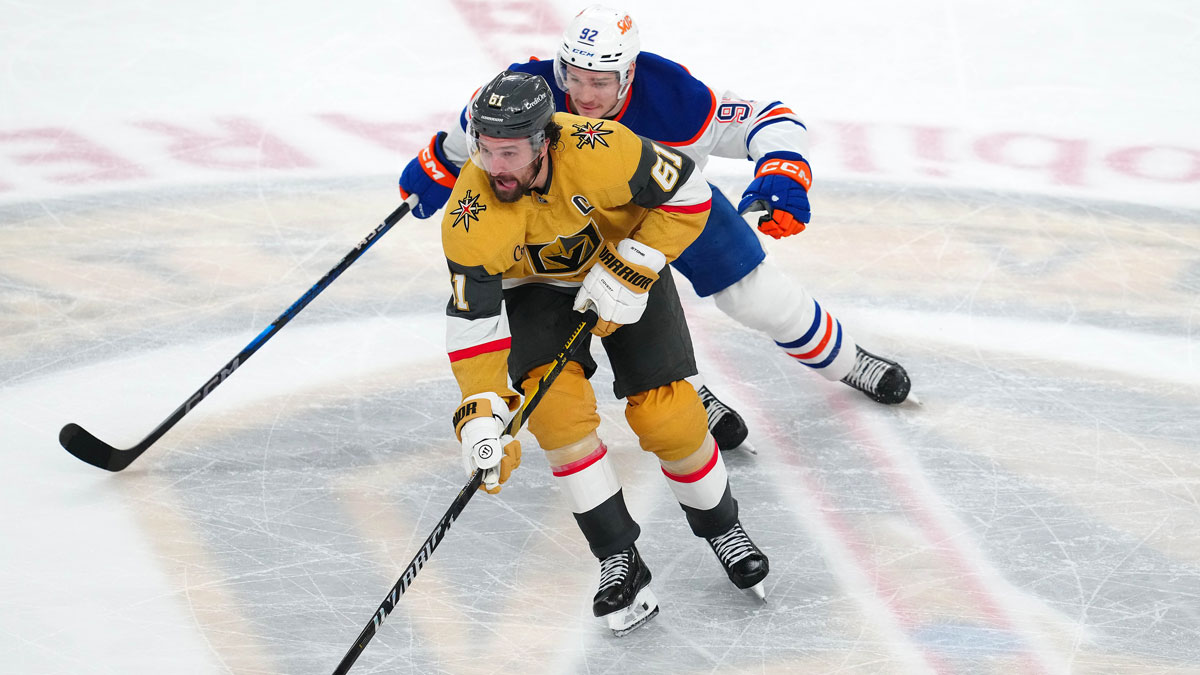 Vegas Golden Knights right wing Mark Stone (61) skates away from Edmonton Oilers right wing Vasily Podkolzin (92) during an overtime period of game two of the second round of the 2025 Stanley Cup Playoffs against the Edmonton Oilers at T-Mobile Arena.