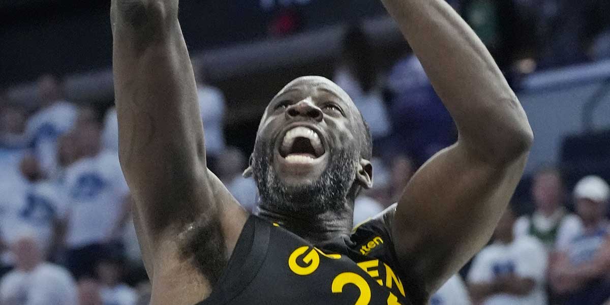 Golden State Warriors forward Draymond Green (23) goes to the basket against the Minnesota Timberwolves in the fourth quarter during game one of the second round for the 2025 NBA Playoffs at Target Center.