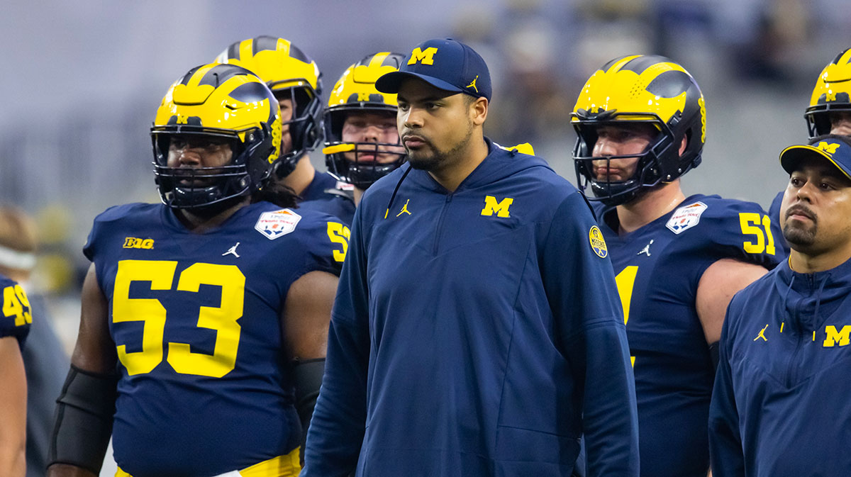 Michigan Wolverines tight ends coach Grant Newsome against the TCU Horned Frogs during the 2022 Fiesta Bowl at State Farm Stadium.