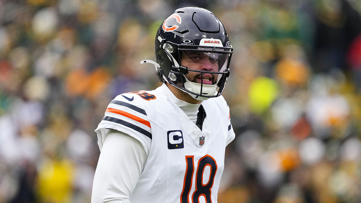 Jan 5, 2025; Green Bay, Wisconsin, USA; Chicago Bears quarterback Caleb Williams (18) during the game against the Chicago Bears at Lambeau Field. Mandatory Credit: Jeff Hanisch-Imagn Images