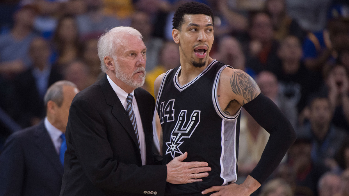 San Antonio Spurs head coach Gregg Popovich (left) instructs guard Danny Green (14, right) during the first quarter against the Golden State Warriors at Oracle Arena. The Warriors defeated the Spurs 112-101.
