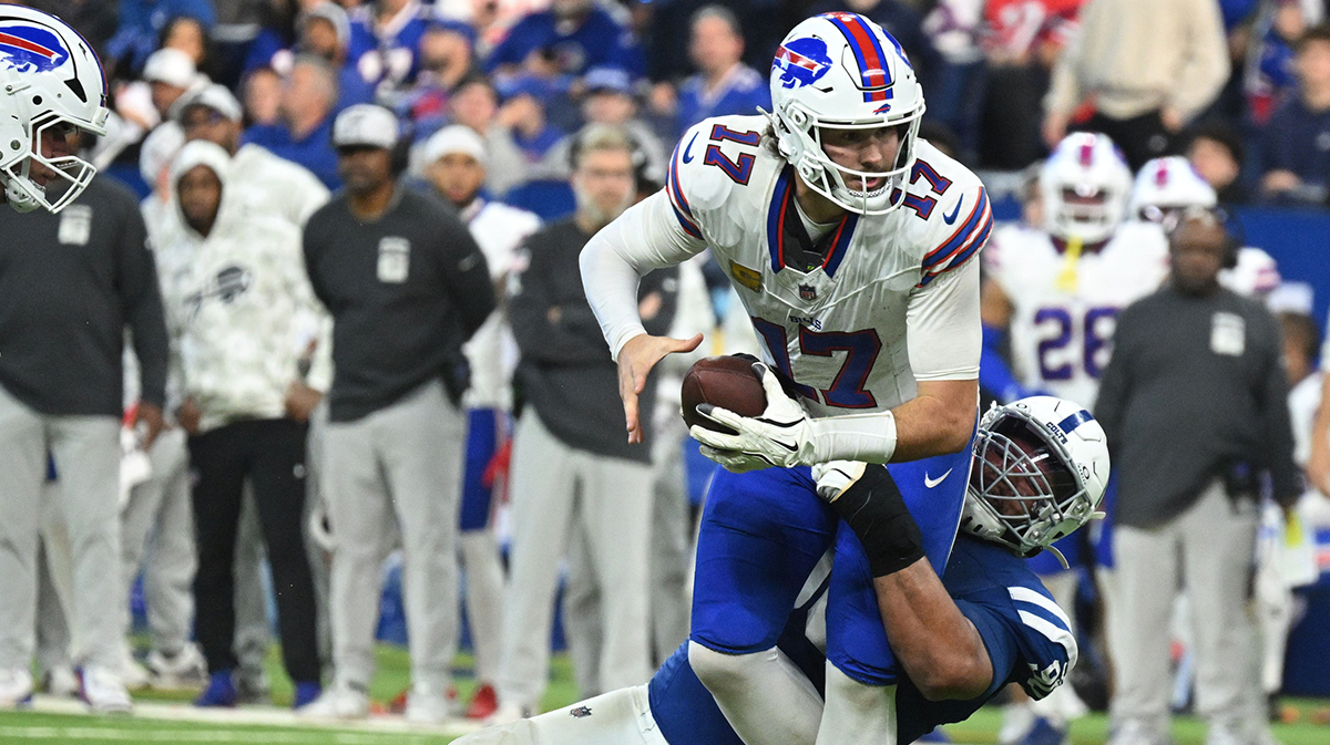 Buffalo Bills quarterback Josh Allen (17) is sacked by Indianapolis Colts defensive tackle Grover Stewart (90) during the second half at Lucas Oil Stadium.