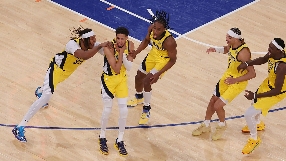 Indiana Pacers guard Tyrese Haliburton (0) celebrates with teammates after tying the game in the fourth quarter to send the game to overtime against the New York Knicks during game one of the eastern conference finals for the 2025 NBA Playoffs at Madison Square Garden.