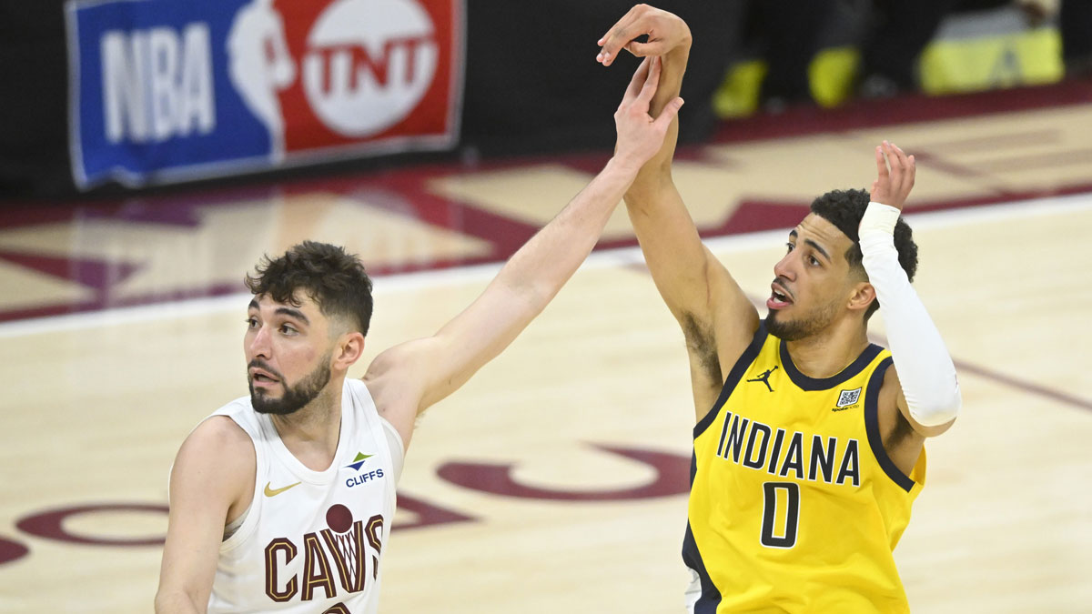 Cleveland Cavaliers guard Ty Jerome (2) defends Indiana Pacers guard Tyrese Haliburton (0) on a follow through for a game-winning three-point basket in the fourth quarter during game two of the second round of the 2025 NBA Playoffs at Rocket Arena