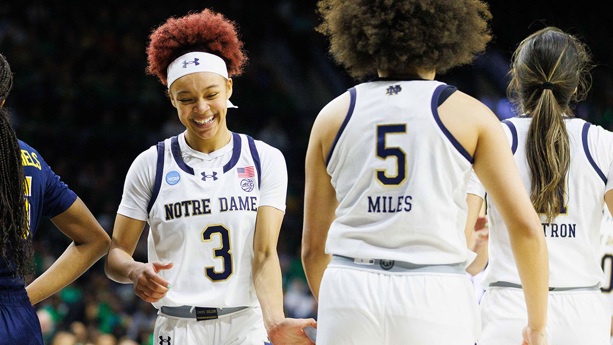 Notre Dame guard Hannah Hidalgo (3) slaps hands with guard Olivia Miles (5) during the second round of the NCAA Women's Basketball Tournament between Notre Dame and Michigan