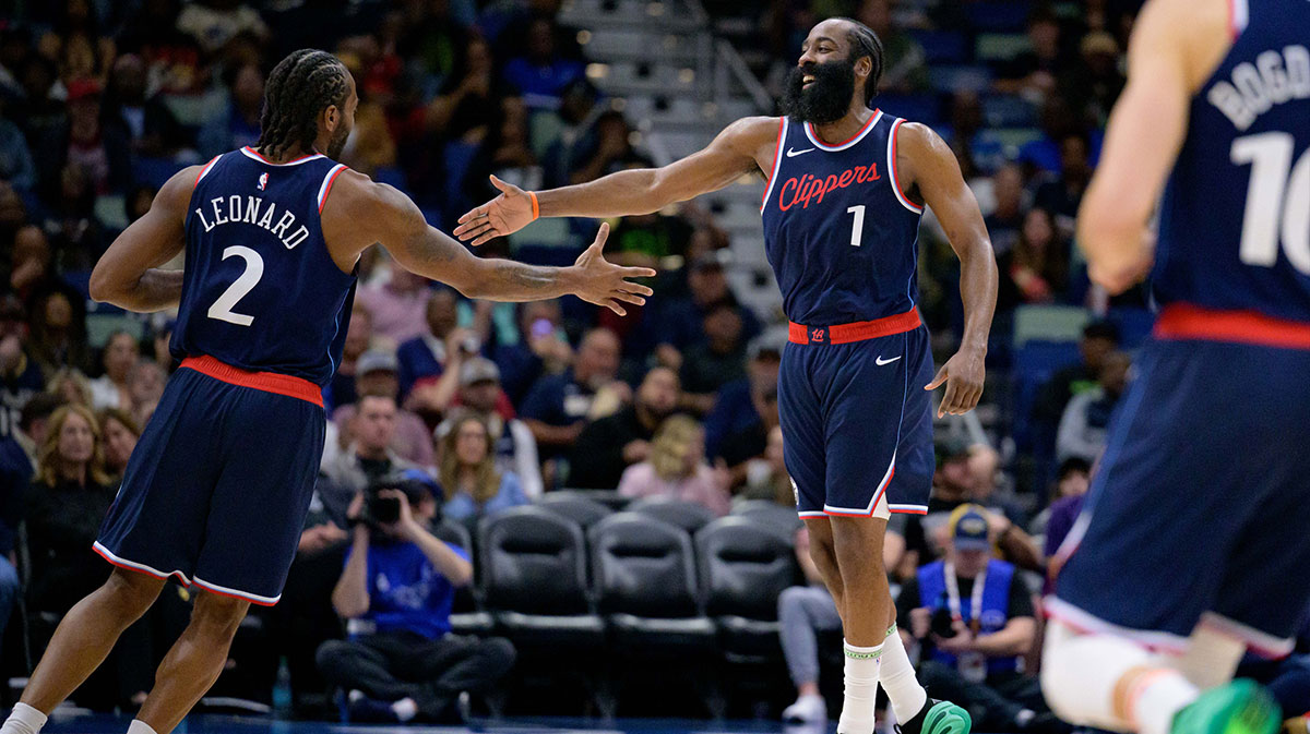 Los Angeles Clippers forward Kawhi Leonard (2) and Los Angeles Clippers guard James Harden (1) react during the second half against the New Orleans Pelicans at Smoothie King Center.