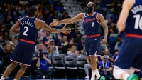 Los Angeles Clippers forward Kawhi Leonard (2) and Los Angeles Clippers guard James Harden (1) react during the second half against the New Orleans Pelicans at Smoothie King Center.