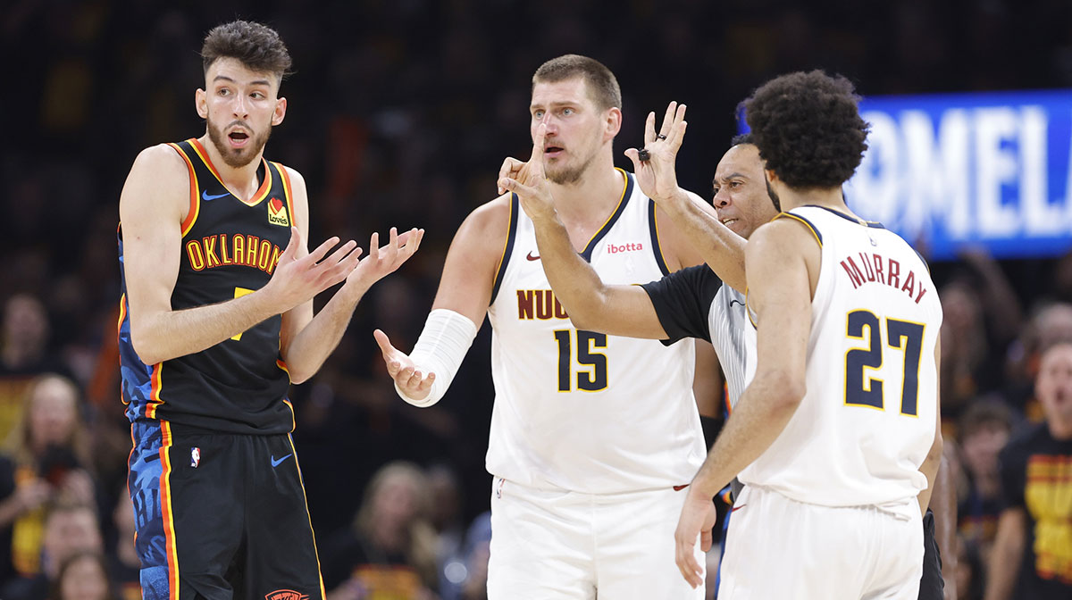 Oklahoma City Thunder forward Chet Holmgren (7) and Denver Nuggets center Nikola Jokic (15) react to a play during the second half in game one of the second round for the 2025 NBA Playoffs at Paycom Center