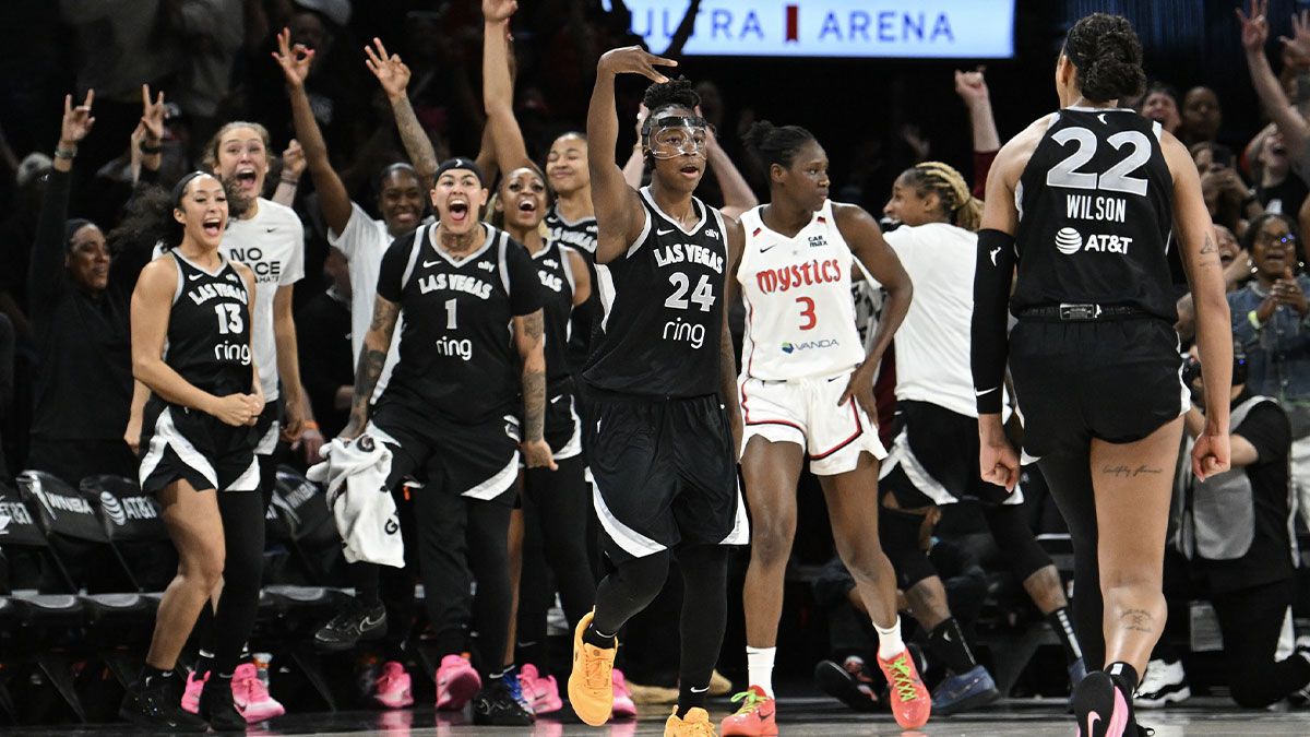 Las Vegas Aces guard Jewell Loyd (24) celebrates hitting a game-winning three-point basket against the Washington Mystics in the fourth quarter of their game at Michelob Ultra Arena.