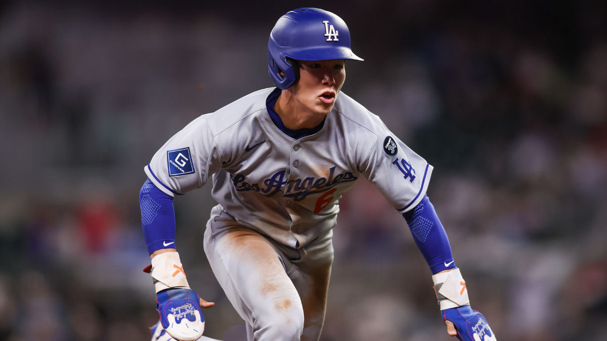 Los Angeles Dodgers second baseman Hyeseong Kim (6) slides into third base against the Atlanta Braves in the ninth inning at Truist Park.