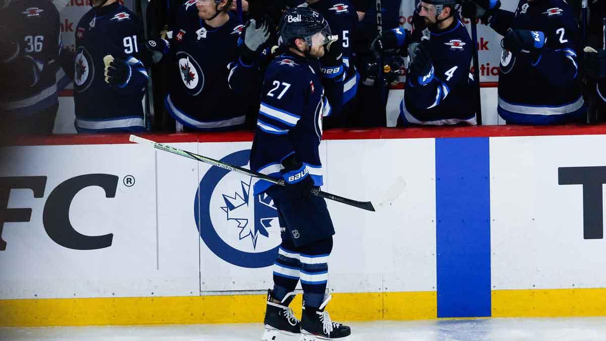 Winnipeg Jets forward Nikolaj Ehlers (27) is congratulated by his teammates after his goal against the Dallas Stars during the third period in game five of the second round of the 2025 Stanley Cup Playoffs at Canada Life Centre.