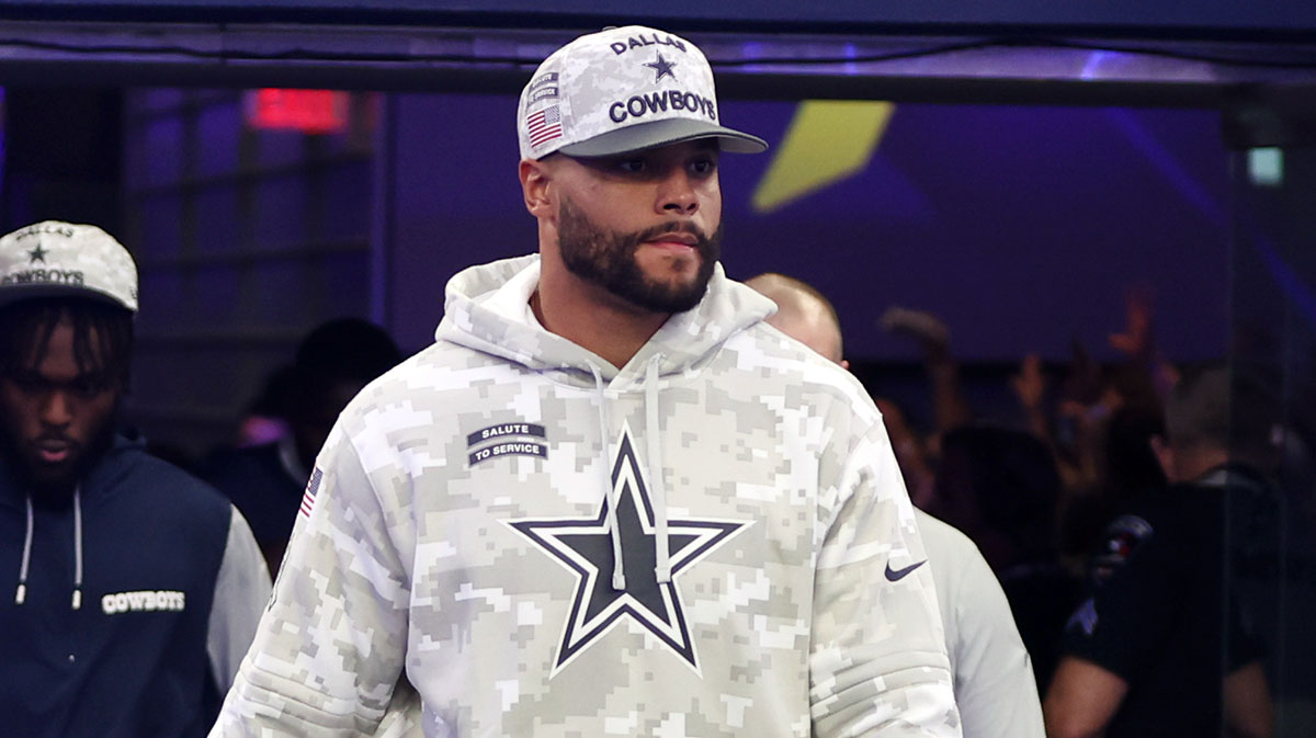 Dallas Cowboys quarterback Dak Prescott (4) walks on to the field before the game against the Philadelphia Eagles at AT&T Stadium.